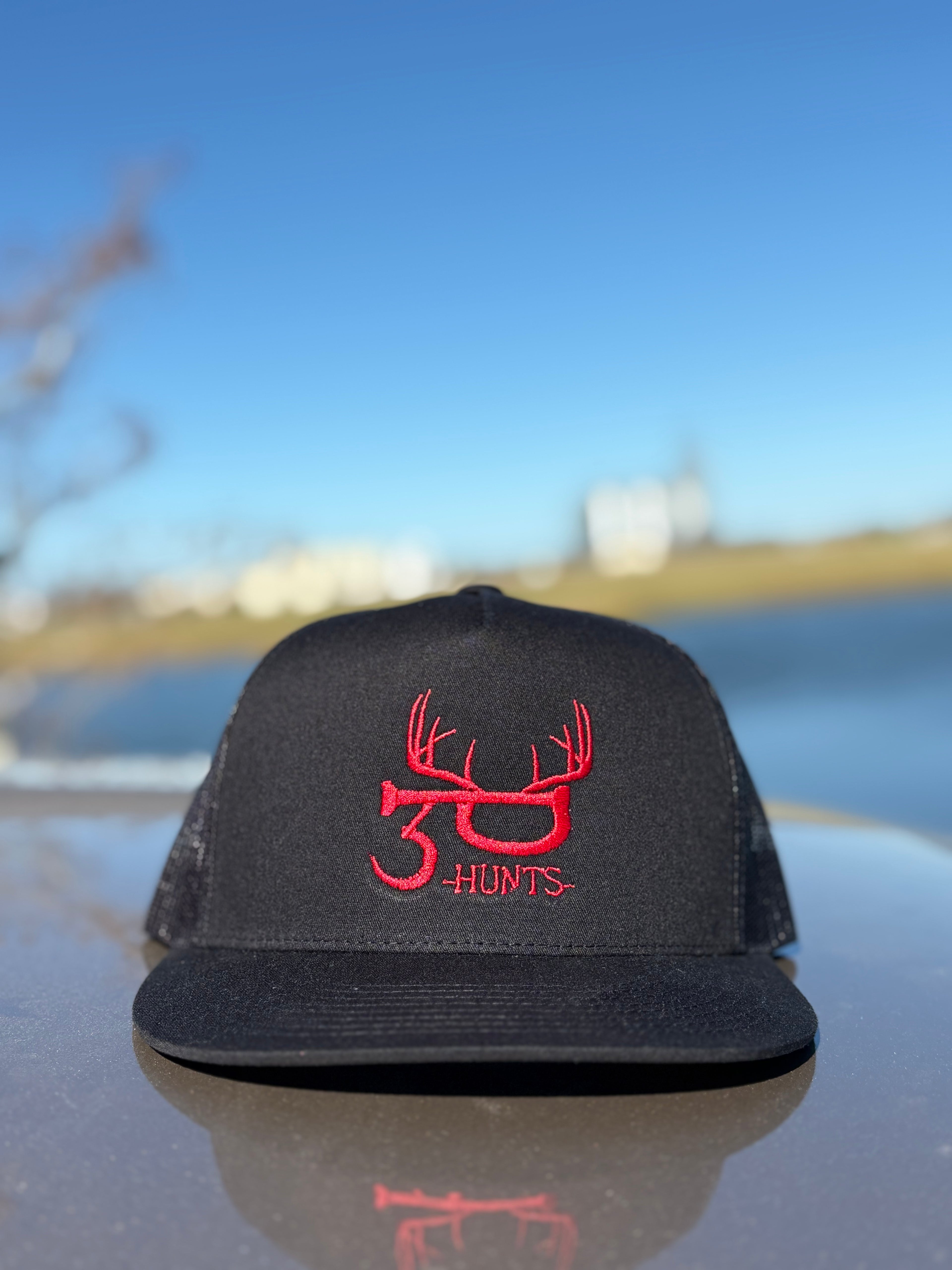 Black hat with red embroidery